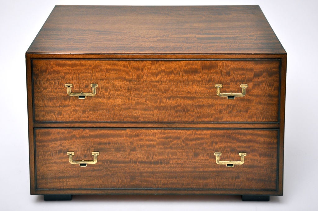 CAMPAIGN STYLE CHEST BY JOHN WIDDICOMB CIRCA THE 1950S.  TWO DRAWERS.  NIGHT STAND OR END TABLE MADE OF RIBBON MAHOGANY.   JOHN WIDDICOMB COMPANY WAS A HIGH END CASE GOODS BUSINESS IN GRAND RAPIDS MICHIGAN FOR 105 YEARS .
