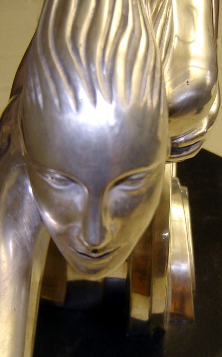 The ultimate art deco bronze!  This is Maurice Guiraud-Riviere’s (1881 – 1947) silvered bronze “The Comet”.  As the lady streaks earthward over stylized clouds, her hair forms a fan of deco flame.  The bronze is signed “Guiraud-Riviere” and “Etling,