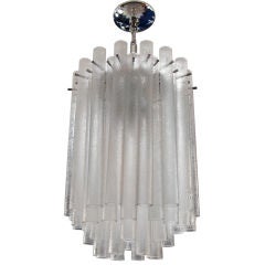 Delicate tiered Venetian chandelier with acid etched crystals.