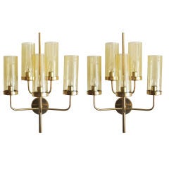 Vintage Large pair of Swedish 5-arm brass and amber glass sconces.