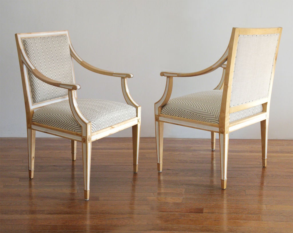 Elegant pair of carved birch fauteuils designed by Carl Malmsten for the Swedish Princess Margaretha's wedding to Prince Axel of Denmark in 1919. This pair produced by Bodafors SMF circa 1930, Art Deco. Newly restored and upholstered. H: 35.5