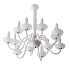 Murano 12-arm opal glass chandelier with glass candles sleeves.