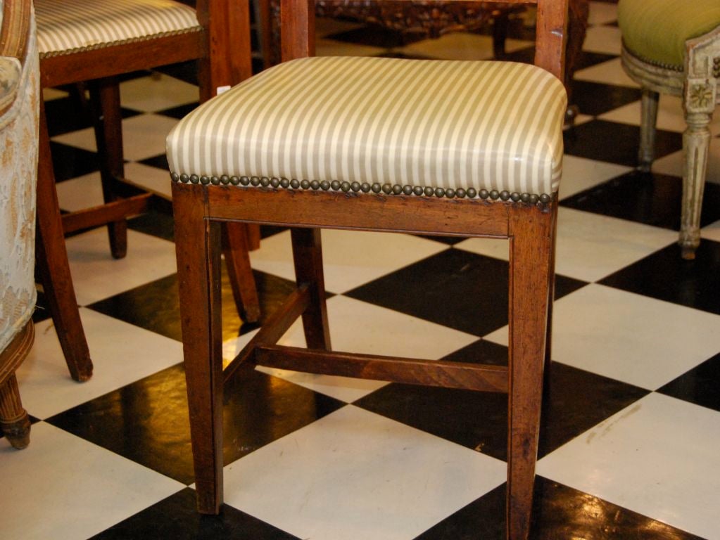 Six French carved back dining chairs