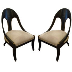 Pair of Ebonized and Gilt  Jansen Style Chairs