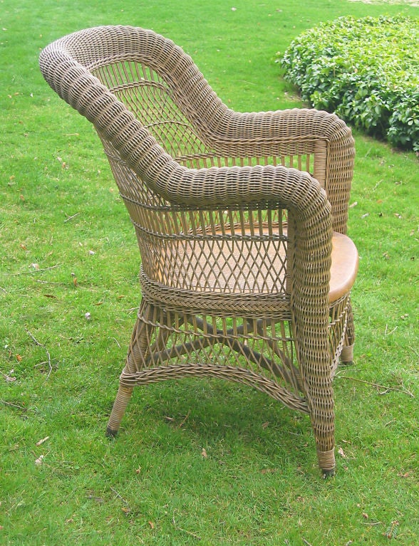 American VICTORIAN WICKER ROLLED-ARM CHAIR