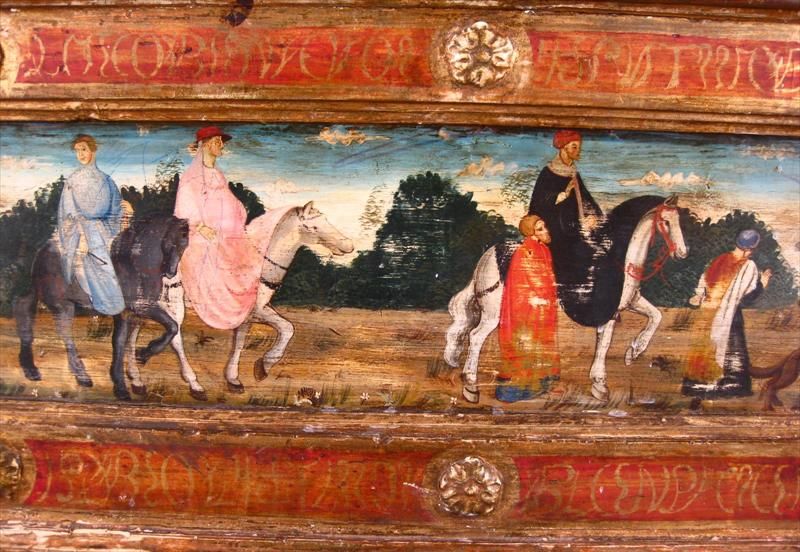 Carved, Painted & Polychrome Decorated Renaissance Cassone with overall painted, polychrome & gilt decorations, the top having painted shield designs, the front having a painted landscape scene of figures on horseback, surrounded by red border with