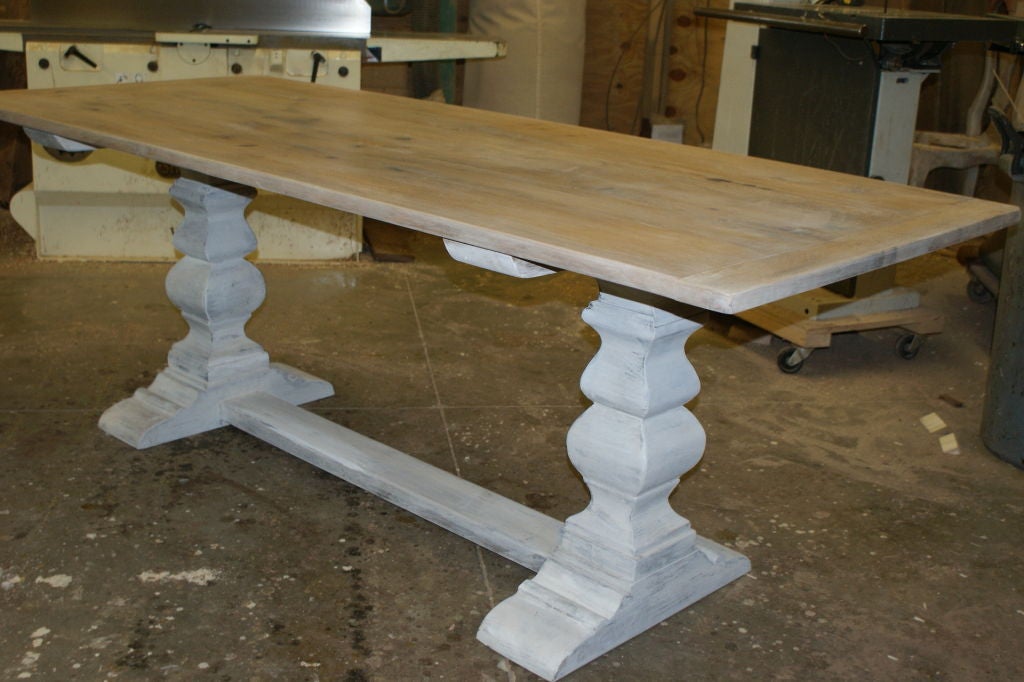 Rustic country farm table with white washed oak top and painted double pedestal bases.  <br />
keywords:  dining table, kitchen table, indoor outdoor dining table, center hall table, library table, desk, entry hall table, server, console table,