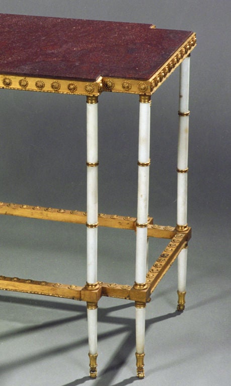 A Fine Louis XVI Ormolu Mounted Porphyry Center Table