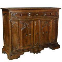 An Italian Baroque Walnut Credenza