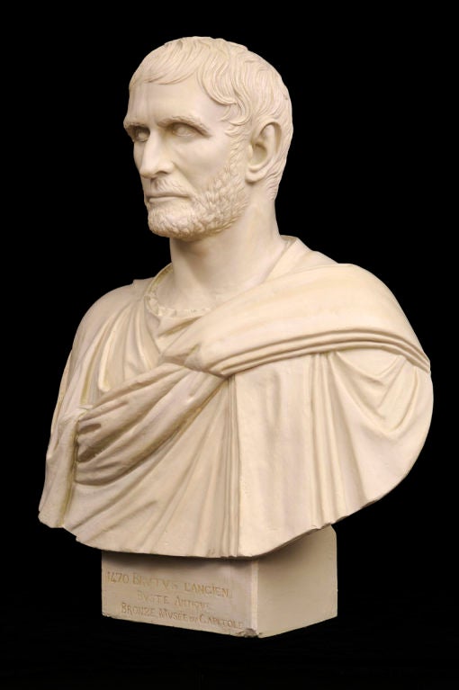 A large Grand Tour plaster antique reproduction bust of Brutus. Museum cast from the Capitol Museum in Rome. Bottom of sculpture reads 