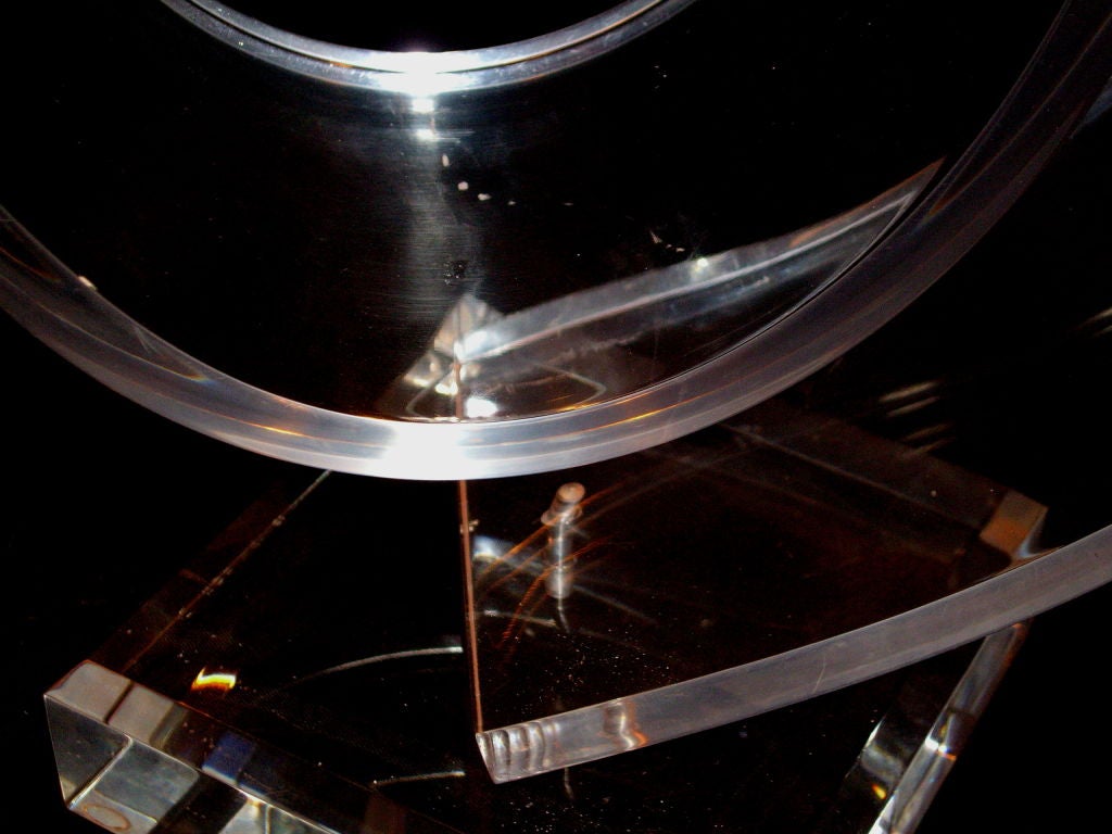 Great form lucite swirl sculpture on rotating base