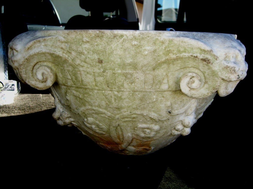 18/19th century carved and inscribed marble fountain head