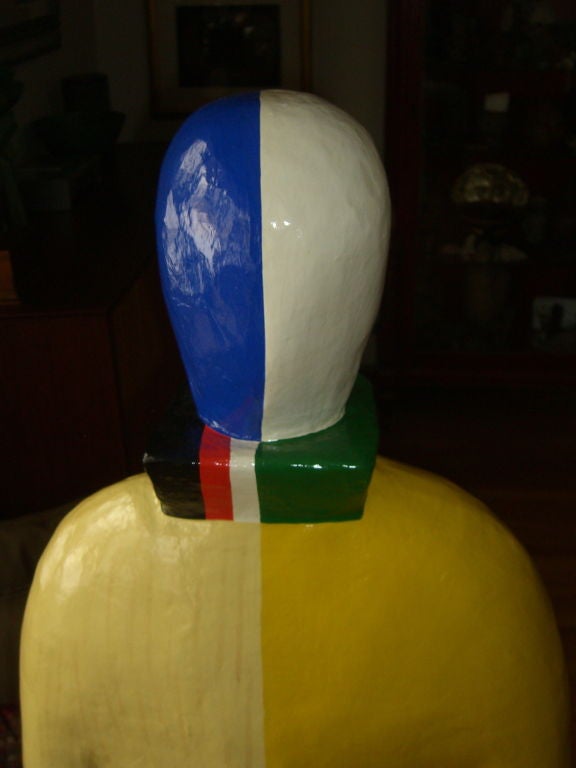 A wonderful vibrant figure the we believe is made of paper mache and painted. It bears a hand written or stamped mark to the base which read Guggenheim Museum Copyright 1996 SRGF. The SRGF stands for Solomon R. Guggenheim Foundation. This piece we