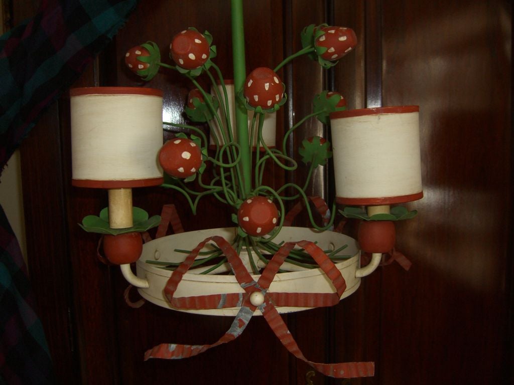 Cute tole and wood chandelier with strawberries and vines