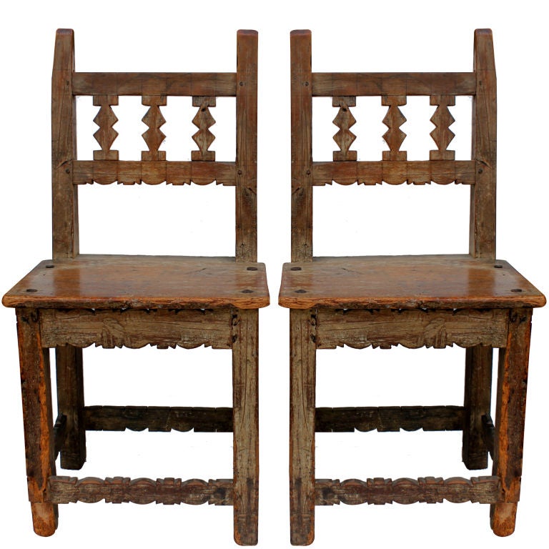Early pair of hand carved spanish colonial new mexico chairs