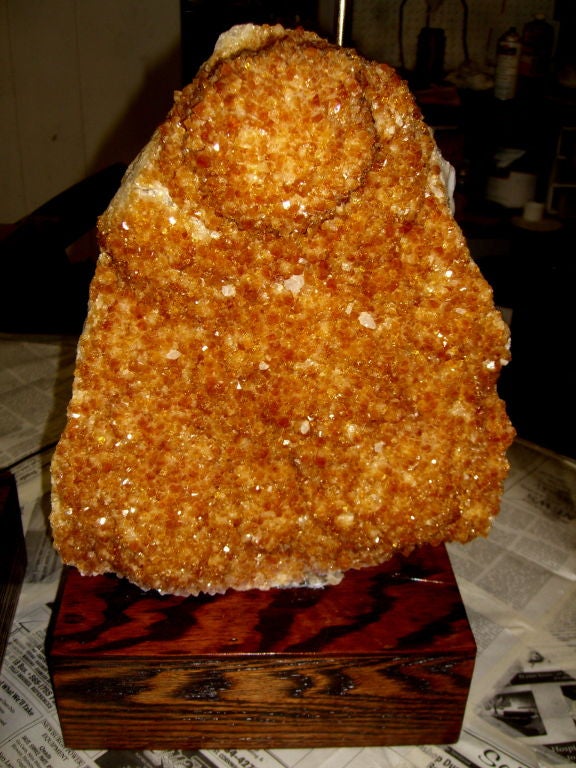 A truly stunning pair of large Citrine quartz lamps mounted on oak lacquered bases. The citrine pieces are 15 inches tall alone 18.5 inches tall with the bases and the lamps measure 33.5 inches to the finial tops. These specimen's are unique because