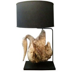 Vintage eroded teak pelican lamp