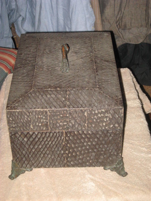 Shark skin cedar cigar box with bronze feet and shaking hands cover lift.