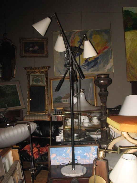 Pair of ;Triennale Arredoluce three-arm adjustable early floor lamp-handles and pole covered in black leather on marble base-floor pouch on/off switch-base marked Italy, 

