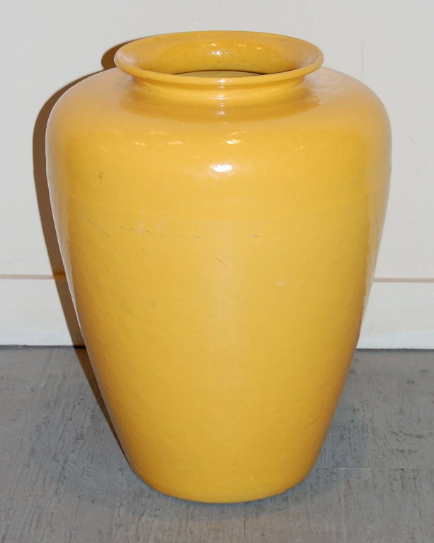 Large oil jar from Garden City, beautiful yellow coloring to the glaze, along with a timeless form.