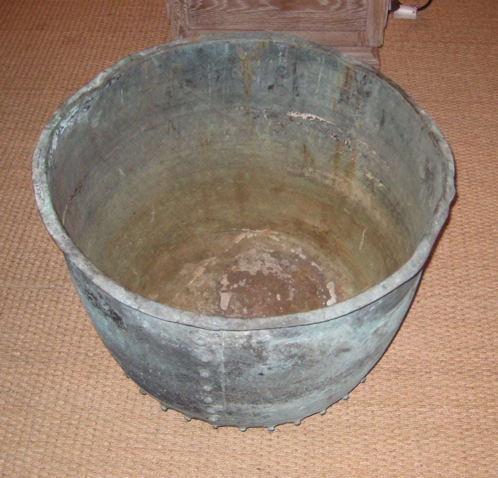 An unusual large industrial copper pot, with a great verde gris patination.
