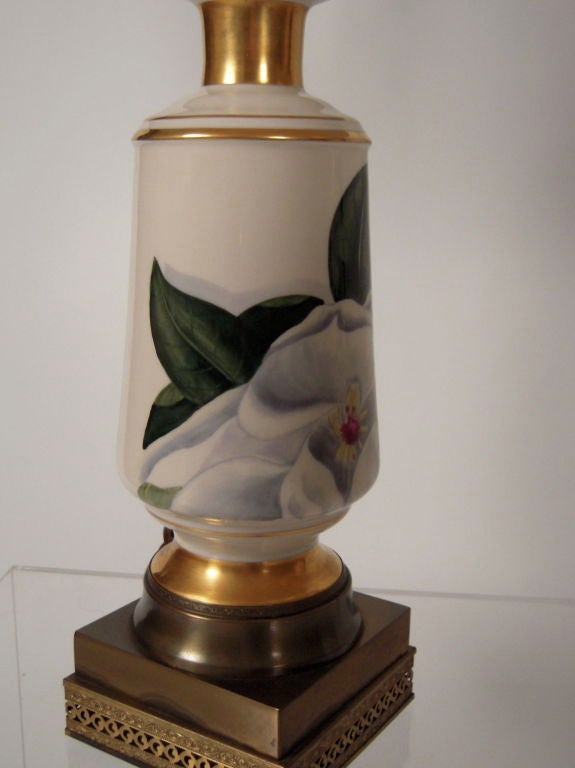 20th Century PAIR OF MAGNOLIA DECORATED PORCELAIN LAMPS