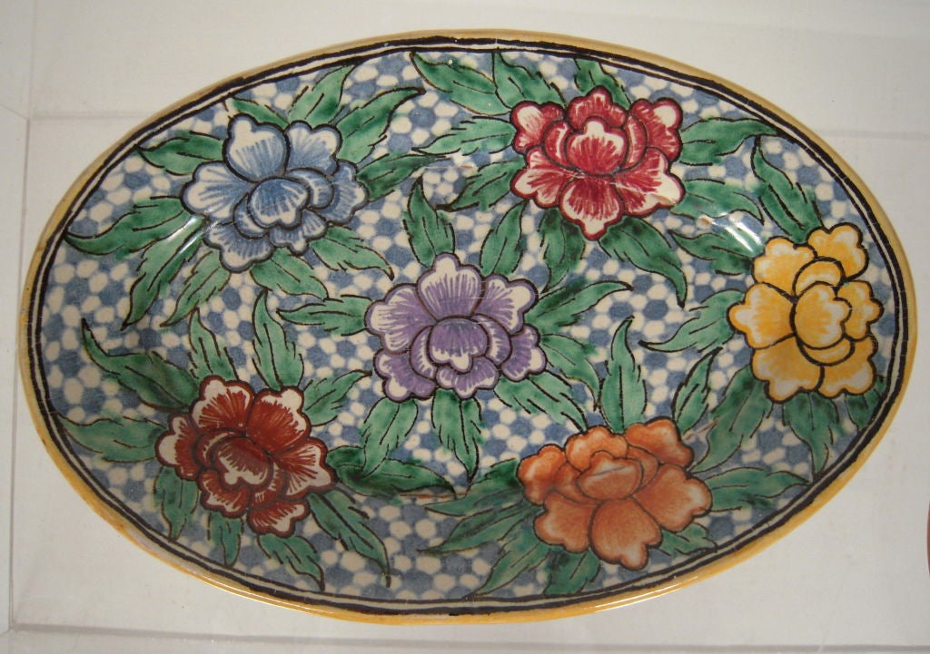 A vintage Mexican hand painted pottery 'Talavera' style platter and plate from Puebla, Mexico, circa 1940s-40s. Signed.<br />
Acquired from a private Texas collection which was built over many years. These wares are hard to find and not made in