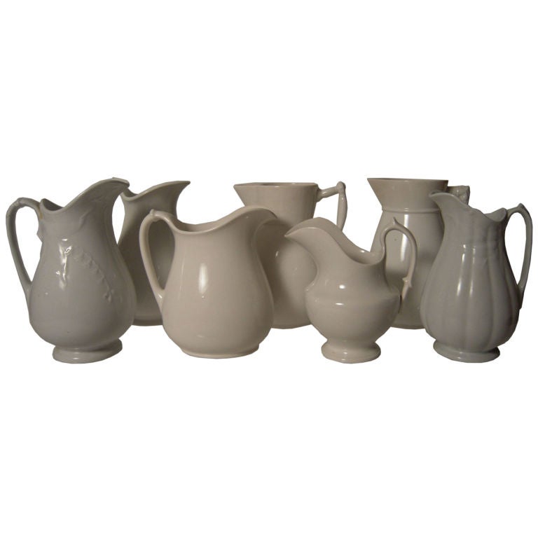 COLLECTION OF 7 19TH C WHITE IRONSTONE PITCHERS