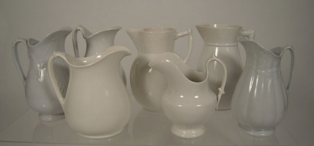 COLLECTION OF 7 19TH C WHITE IRONSTONE PITCHERS 6