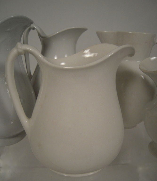 Glazed COLLECTION OF 7 19TH C WHITE IRONSTONE PITCHERS