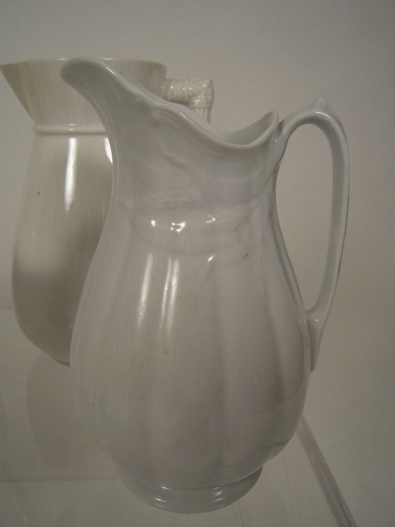 COLLECTION OF 7 19TH C WHITE IRONSTONE PITCHERS 1