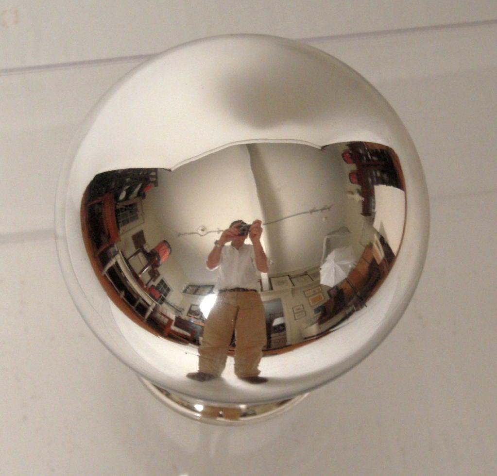 A mercury glass 'butler's ball', used in a dining room to survey progress of patrons/guests. Wonderful sculptural  antique, but modern looking, decoration,<br />
made of double-walled glass lined with silver nitrite--NO mercury!