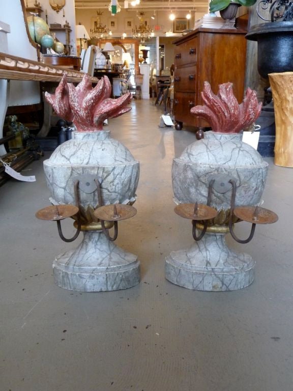 Pair of 19th century marbleized two-arm wooden candelabra.