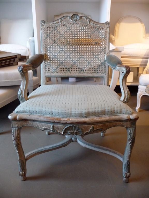 18th century painted cane-back armchair.
