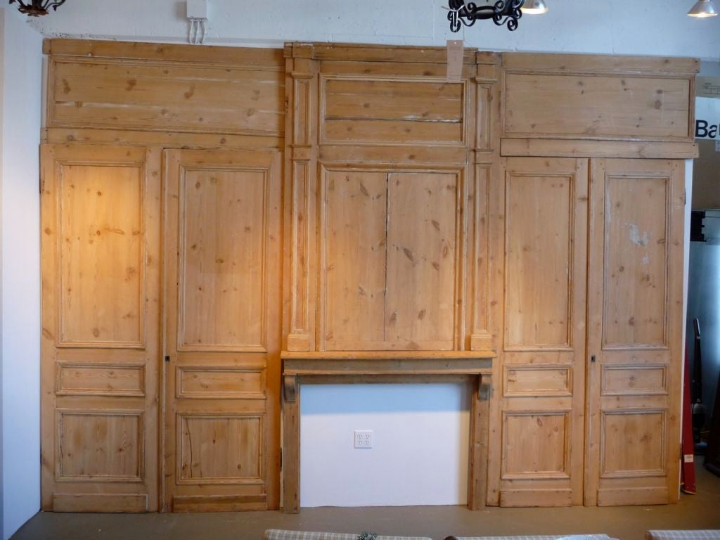 A wonderful set of 18th century stripped pine paneling. For exact dimensions please contact dealer.