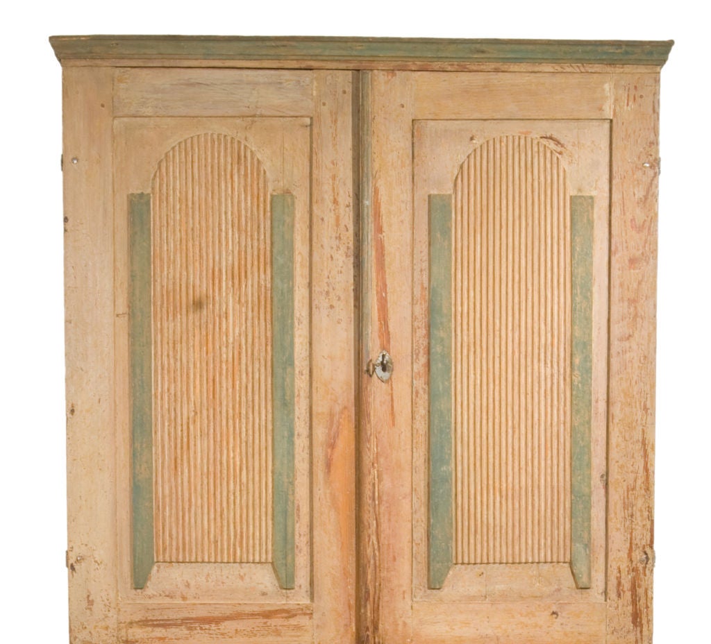 Museum quality four Door Gustavian Cabinet dryscaped down to the original paint; original hardware; from the Southern Region of Sweden.  Beautiful patina!