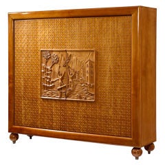 Cabinet by Osvaldo Borsani with carving by Voltan