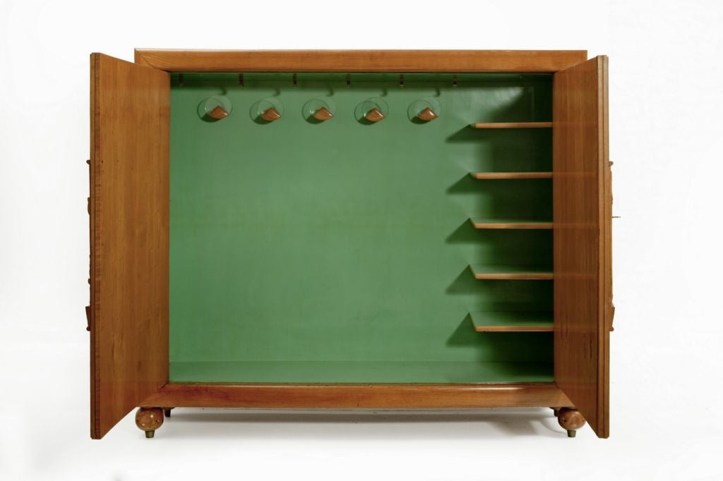 Mid-20th Century Cabinet by Osvaldo Borsani with carving by Voltan For Sale