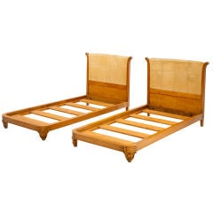 Pair of maple and parchment beds