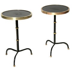 Pair of small drinks tables by Jacques Adnet