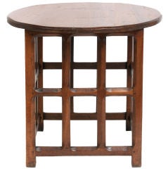 A Pegged Walnut Arts 
Crafts Circular Table by Romney Green.