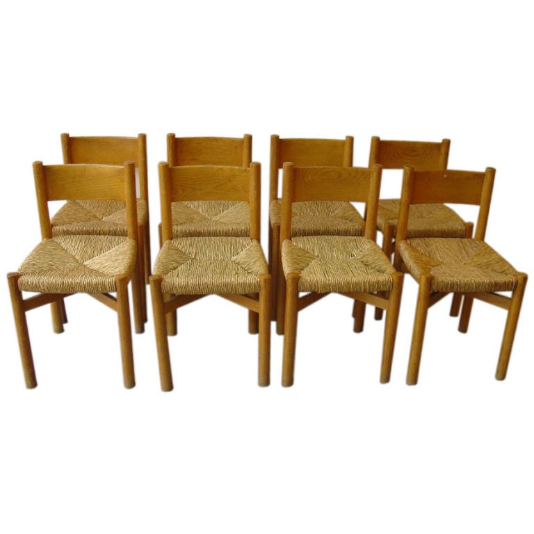 Set of 8 Charlotte Perriand Chairs For Sale