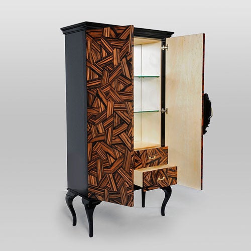 'Guggenheim' cabinet by Pedro Sousa for Boca Do Lobo, Portugal, 2009.



An incredibly striking cabinet with a coromandel exterior opening to reveal a blonde wood interior and engraved mirror.
