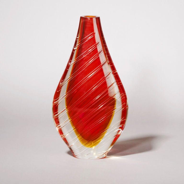 A Collection of Murano Sommerso Glass Vases and Ashtrays in Varying Shapes and Sizes with Deep Red Centres Cased in Clear Glass Italy 1960/70s<br />
 <br />
SN: L5143<br />
A Large Murano Sommerso Teardrop Shaped Glass Vase with a red and gold
