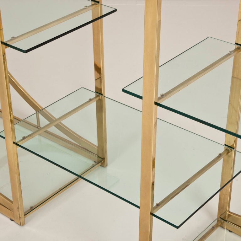 A Pair of 1970s D -Shaped Brassed Metal Etageres with Glass Shelving USA