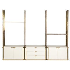 An Italian Cream Lacquered and Gilt Bronze Framed Etagere