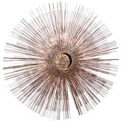 A Large Curtis Jere Style Starburst Metal Wall Sculpture