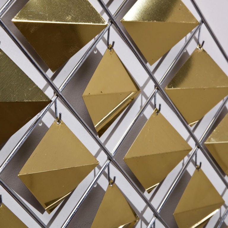 A Brass Diamond Shaped Wall Sculpture on Nickel Plate
