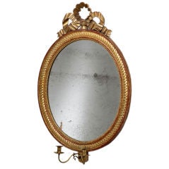 A Late 18th Century Swedish Oval Giltwood Mirror