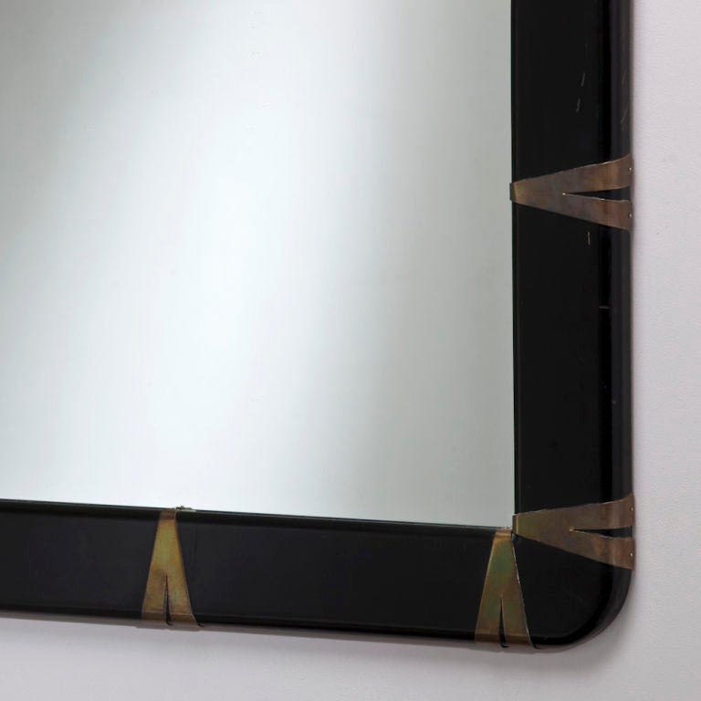 A Spanish Black Lacquered Mirror with Bronzed Metal Detail by Sarreid